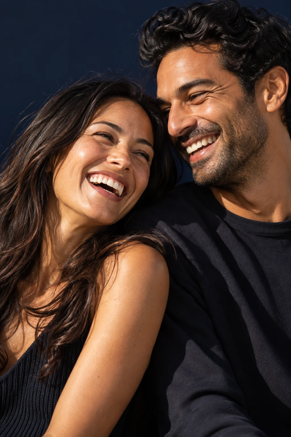 Two people sharing a spontaneous moment in the sun